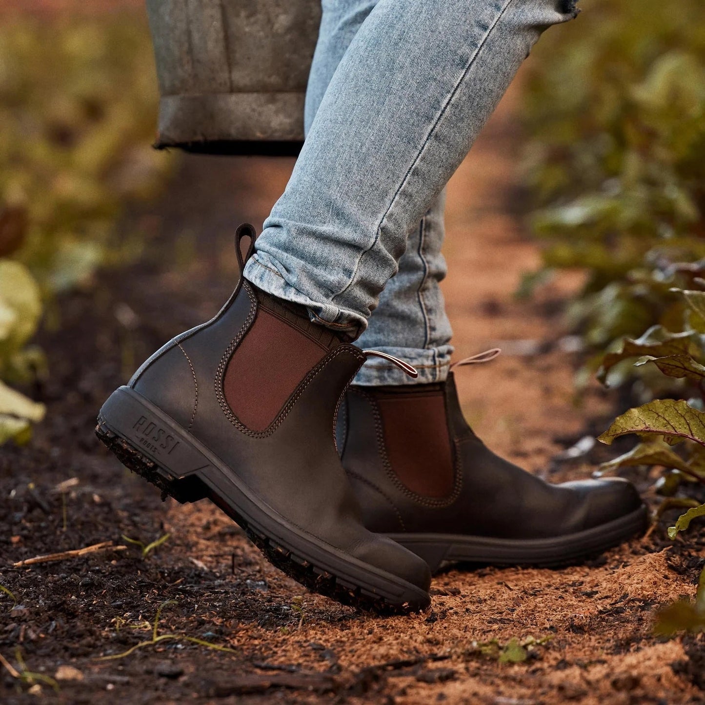 Women wearing a pair of Rossi Endura Boot in the garden